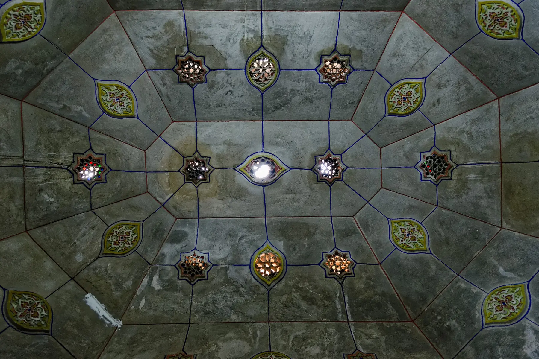 Vault of an old hammam room with small star-shaped skylights
