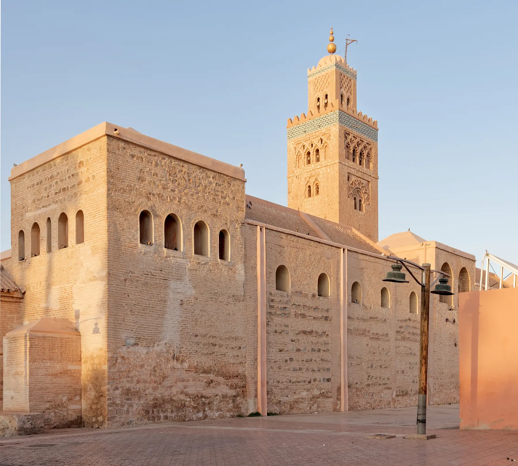 Walls of the Koutoubia Mosque and its minaret in the evening light